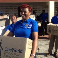 Grenada 2013. Mrs. Champa Barnes, Royal Bank manager in Grenada–and her staff bring our books to Gouyave. image