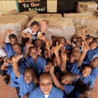 Richard Clewes and the students of Soufrière Primary School. image